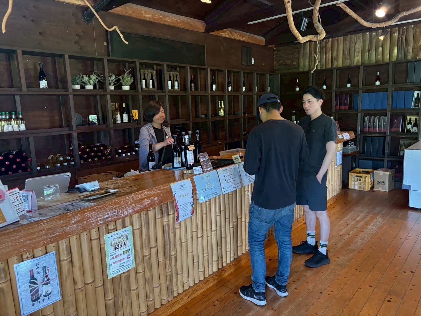 Shelves of wine bottles inside the Kuju Winery shop