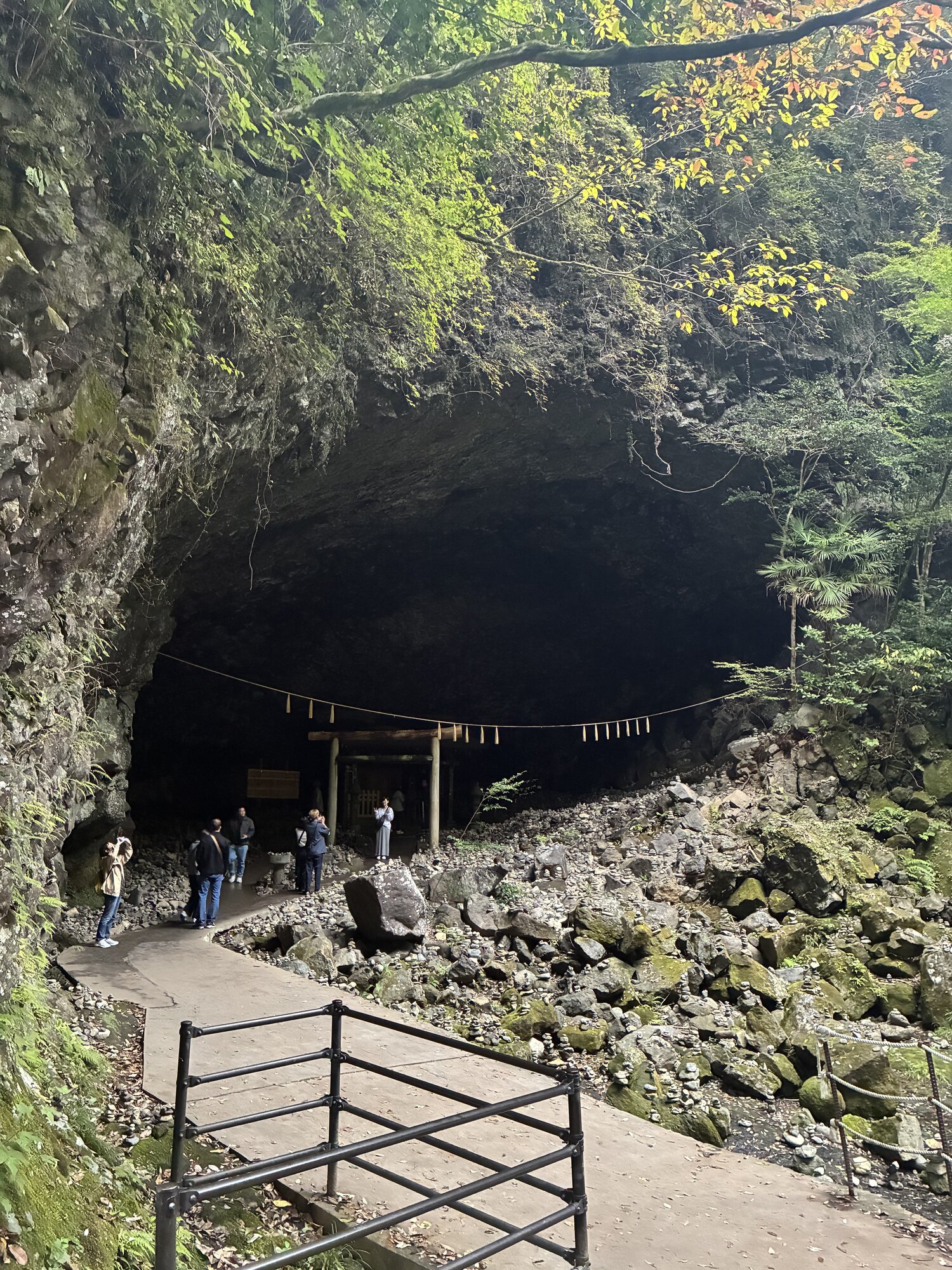 The entrance to Amano Yasukawara cave, with a shimenawa rope strung across the opening